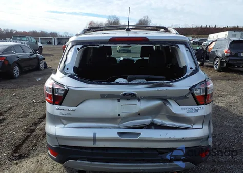 2017 Ford Escape Titanium from USA, damaged, VIN 1FMCU9J98HUD99419